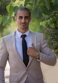 A confident businessman outdoors in a suit, showcasing leadership.